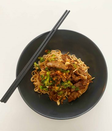 noodles with peanut sauce in a bowl