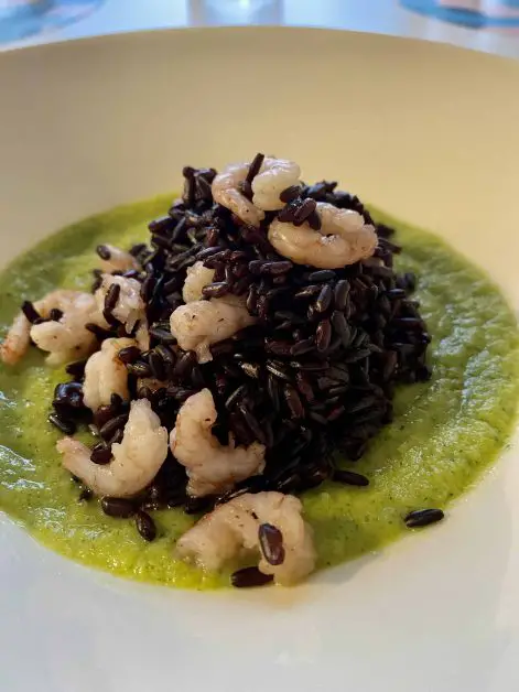 black venus rice with shrimp and zucchini cream