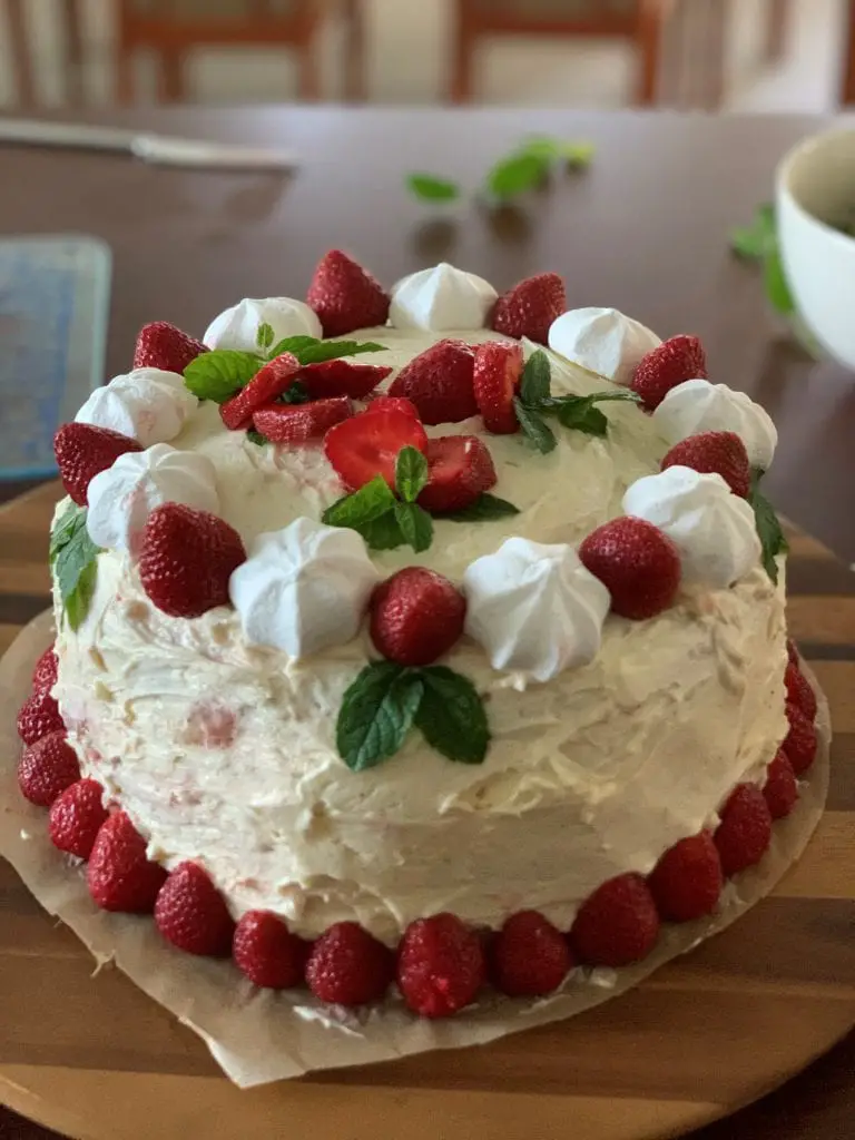 Strawberry birthday cake with buttercream