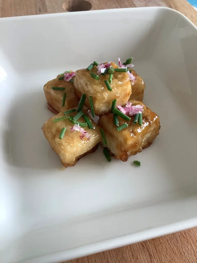 teriyaki tofu in a white plate